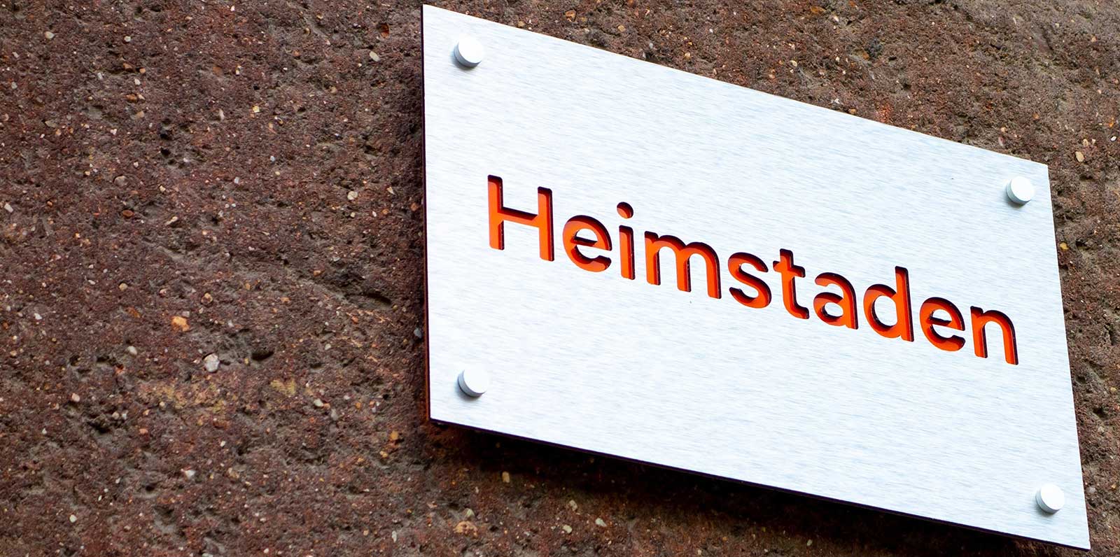 Heimstaden sign on wall